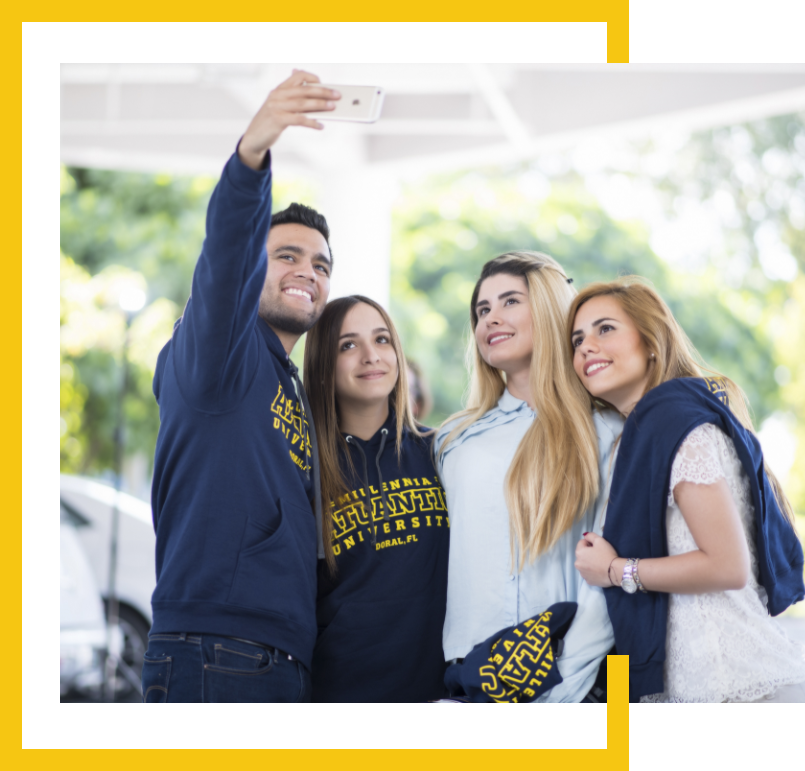 Millennia Atlantic University students taking a group photo with a smart phone
